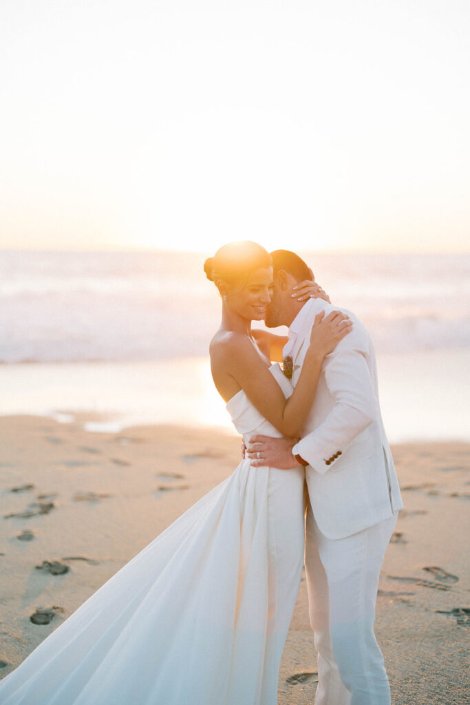 bride and groom portrait on the beach