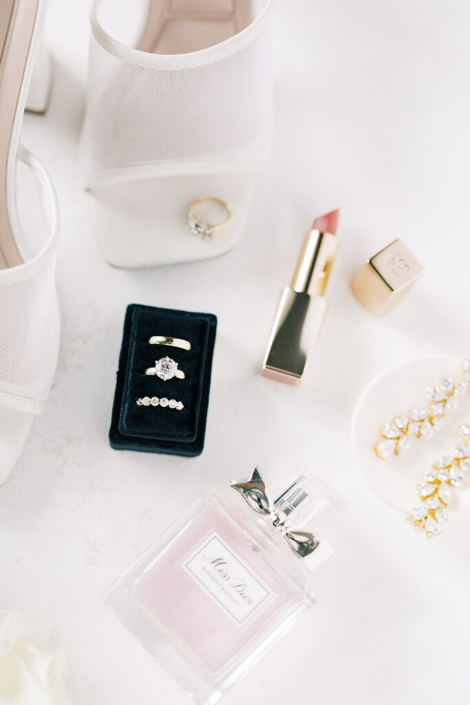brides shoes and jewelry details shot