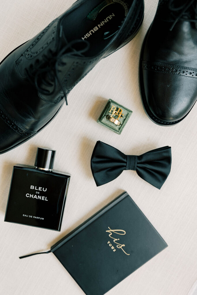 grooms shoes and vows detail shot