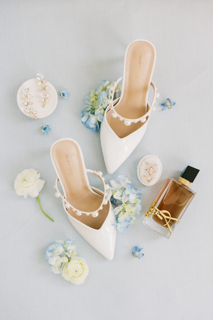 brides shoes and flowers detail shot