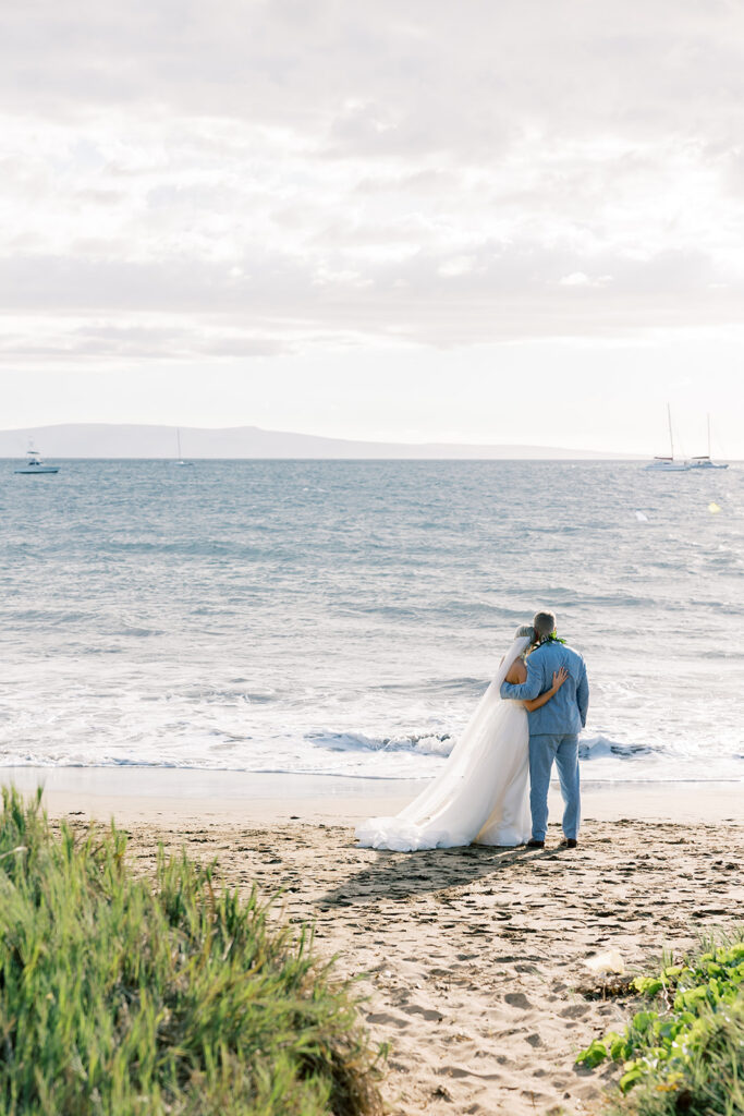 bride and groom portrait on the beach