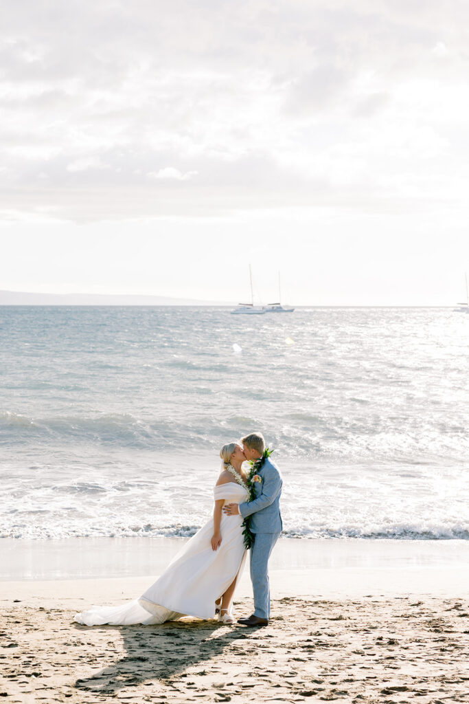 bride and groom portrait on the beach