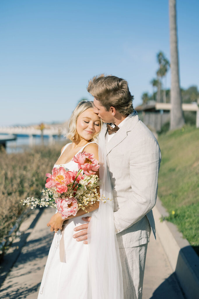 bride and groom portrait on beach
