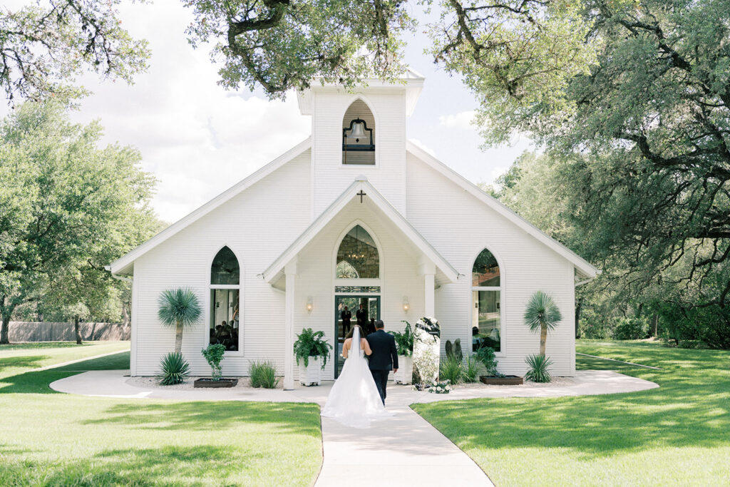 Bride and father walking into ceremony