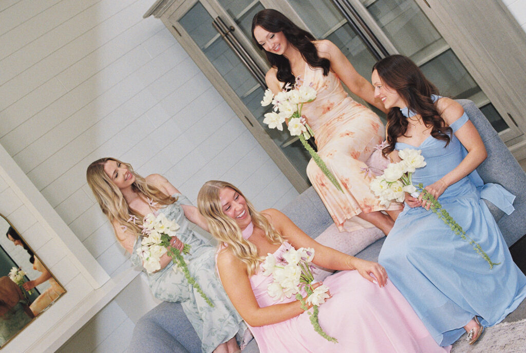 bride and bridesmaids spring colors whimsical flowers 