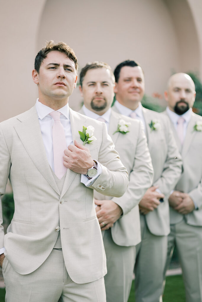 groomsmen at the altar